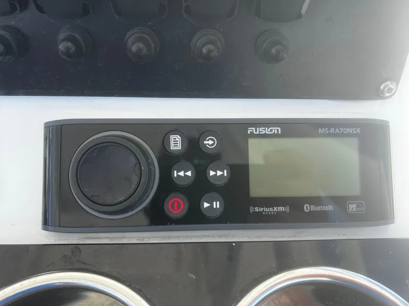 Slide: The Image of Fusion MS-RA70NSX marine stereo on 2022 Blackfin 222 CC boat dashboard. - 18