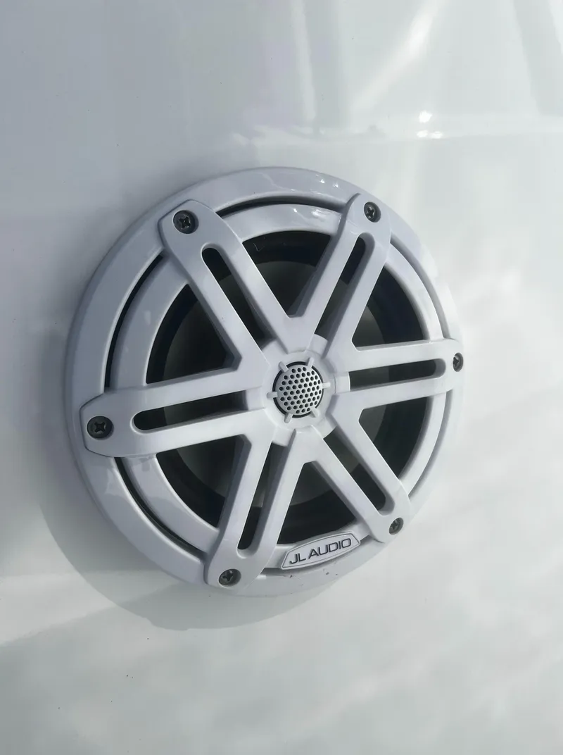 Slide: The Image of White JL Audio speaker on 2022 Blackfin 222 CC boat. - 37