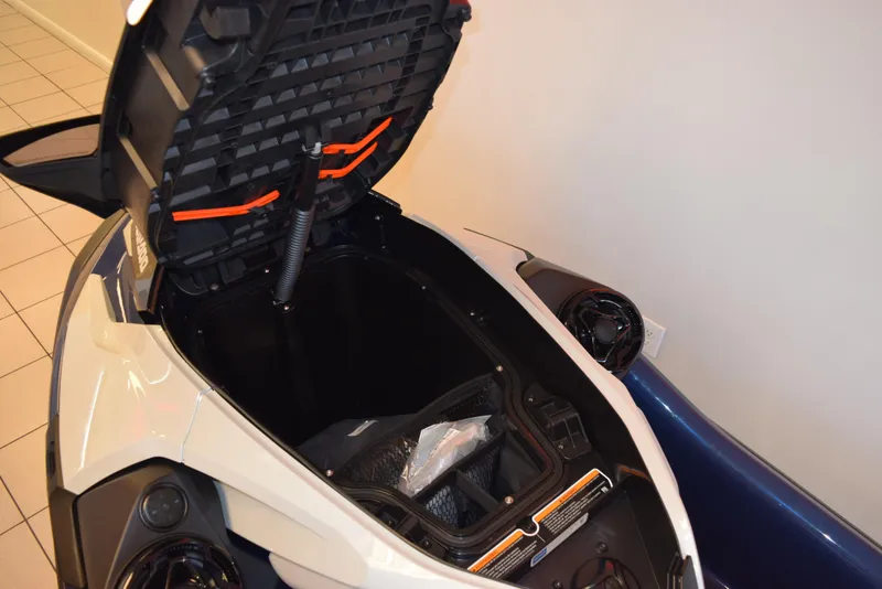 Slide: The Image of 2024 Sea-Doo GTX Limited 300 storage compartment open, showcasing spacious interior design. - 9