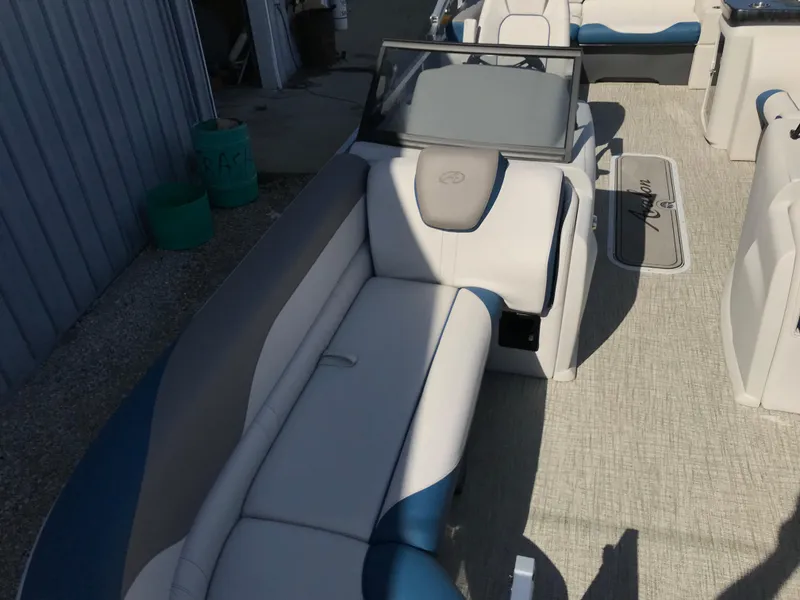 Slide: The Image of 2023 Avalon LSZ Elite Windshield boat interior with plush seating and modern design. - 25