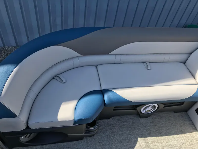 Slide: The Image of 2023 Avalon LSZ Elite Windshield boat seating with blue and gray upholstery. - 30