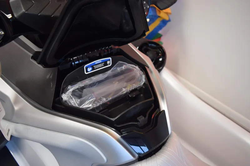 Slide: The Image of 2024 Sea-Doo GTX Limited 300 storage compartment, open view, showcasing interior design. - 9