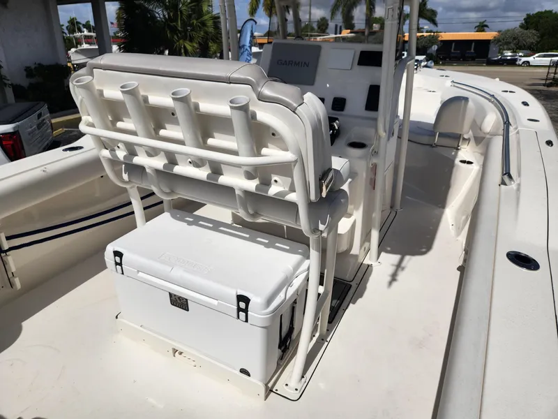 Slide: The Image of 2024 Key West 244 CC boat interior with seating and storage. - 15