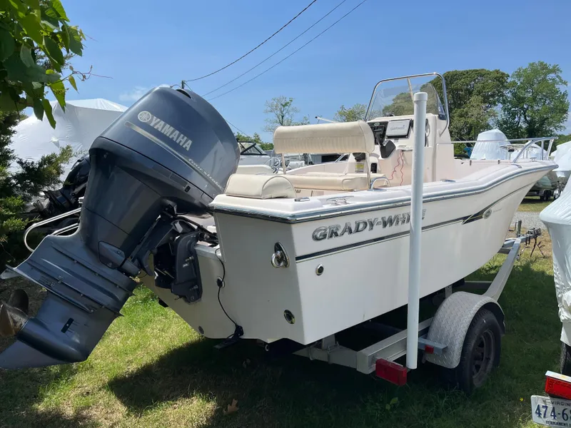 Slide: The Image of 2012 Grady-White Fisherman 180 boat with Yamaha outboard motor on trailer. - 0