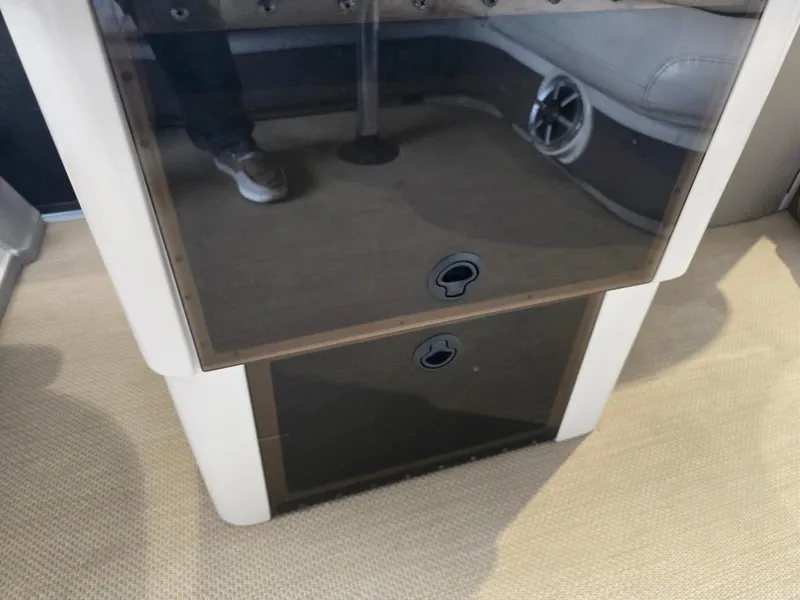 Slide: The Image of 2014 Premier 275 Boundary Waters interior with storage compartments and speaker. - 18