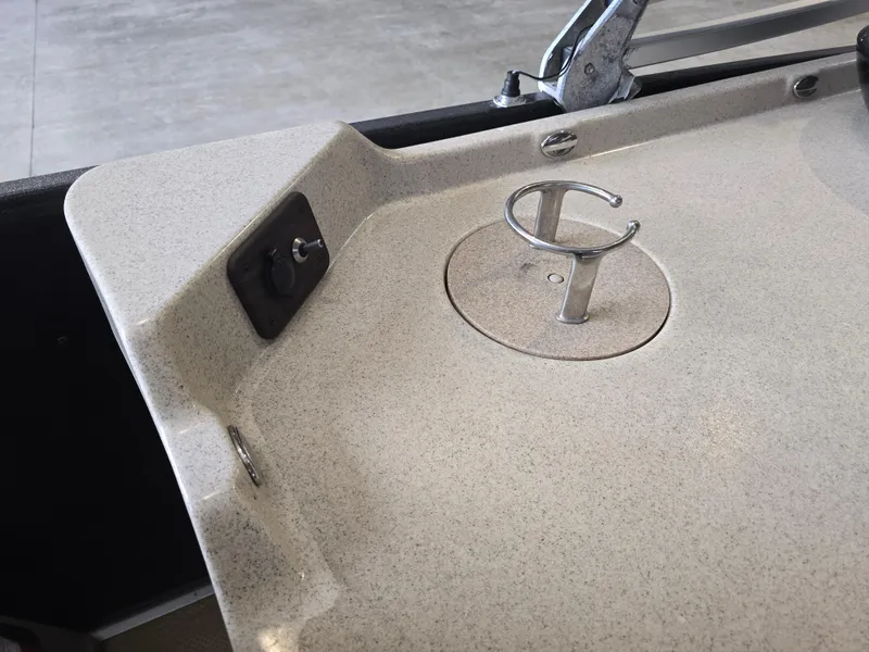 Slide: The Image of 2014 Premier 275 Boundary Waters boat deck with cup holder and control panel. - 20