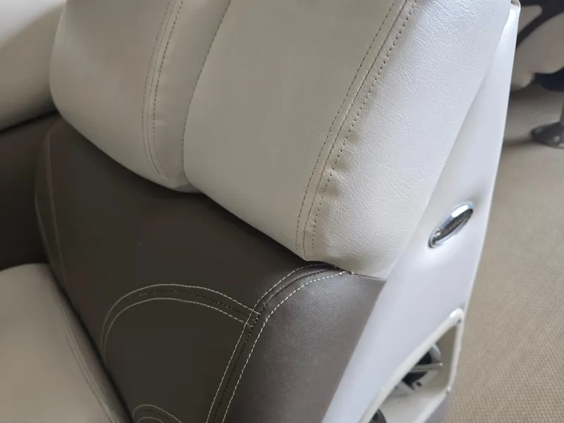 Slide: The Image of Premier 275 Boundary Waters 2014 boat seat, featuring two-tone upholstery and detailed stitching. - 31