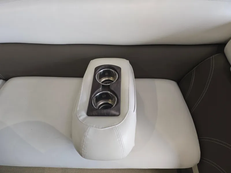 Slide: The Image of 2014 Premier 275 Boundary Waters boat seat with dual cup holders. - 34