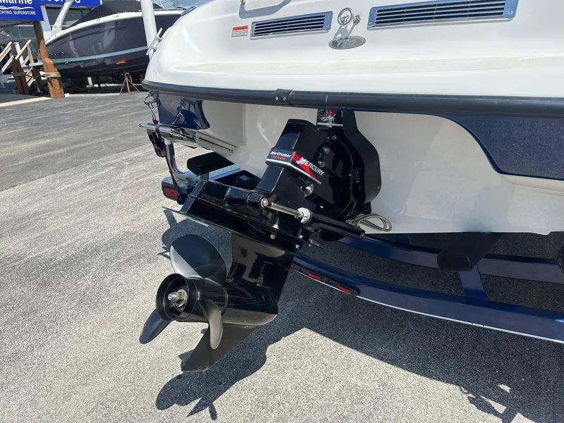 Slide: The Image of 2002 Crownline 180 BR boat stern with propeller and outboard motor. - 9