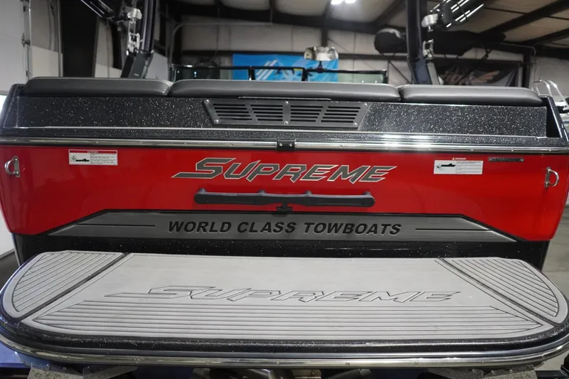 Slide: The Image of 2017 Supreme S211 boat, red and black, labeled "World Class Towboats." - 15