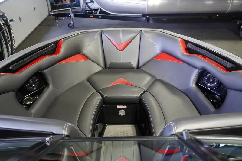 Slide: The Image of Luxurious interior of 2017 Supreme S211 boat with sleek gray and red seating. - 32