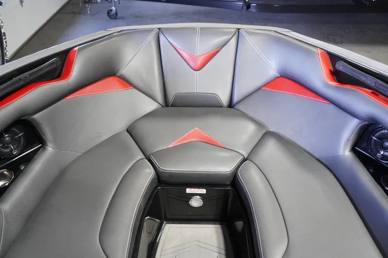 Slide: The Image of Luxurious interior of 2017 Supreme S211 boat with gray and red seating. - 34