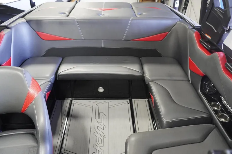 Slide: The Image of 2017 Supreme S211 boat interior with gray and red seating, showcasing luxury and comfort. - 41