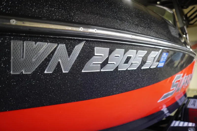 Slide: The Image of 2017 Supreme S211 boat with registration number WN 2905 SL, black and red exterior. - 7