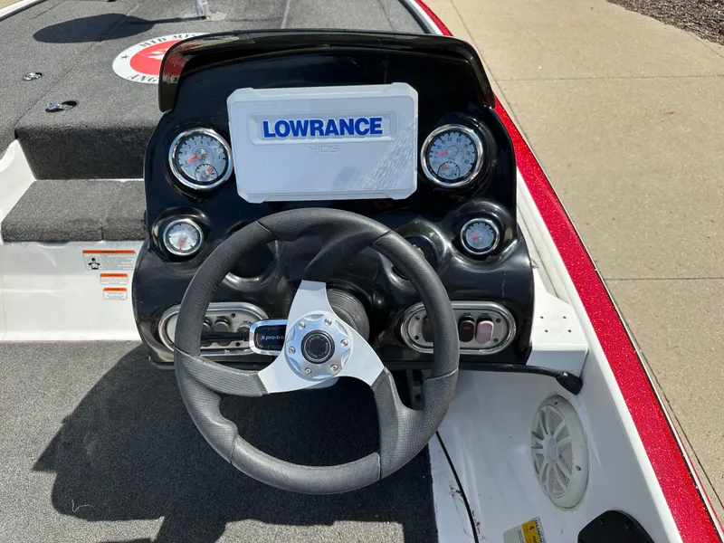 Slide: The Image of Steering console of a 2015 Nitro Z7 DC boat with Lowrance display and gauges. - 4