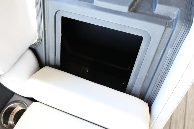 Slide: The Image of Interior storage compartment of 2025 Lowe SS 210 DL boat. - 32