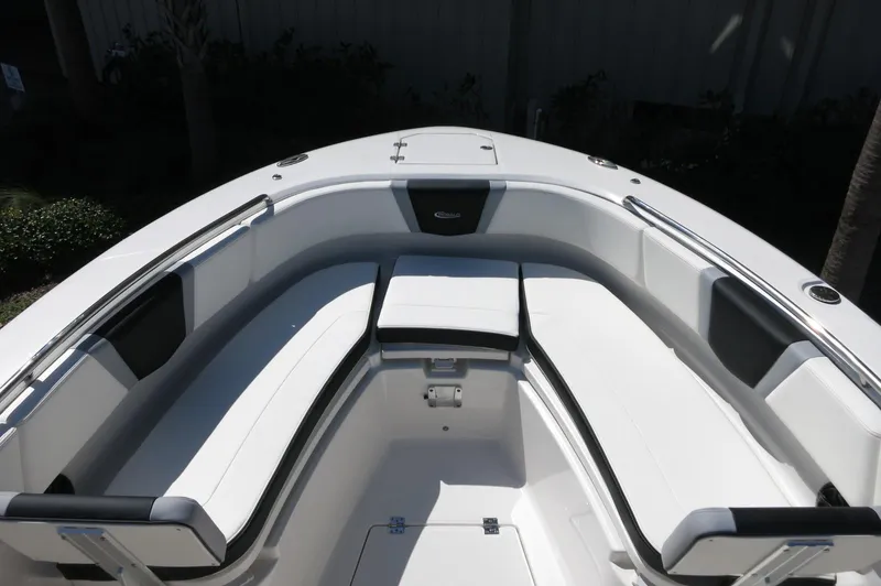 Slide: The Image of 2025 Robalo R250 Center Console boat with spacious seating area. - 14