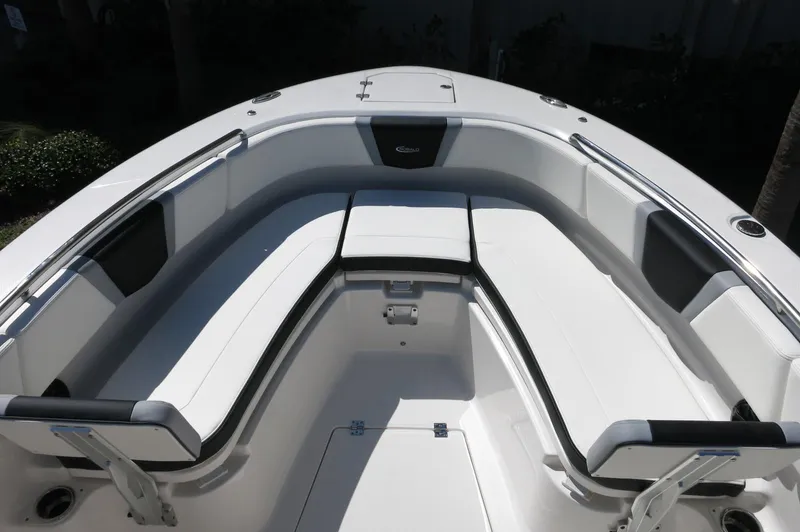 Slide: The Image of 2025 Robalo R250 Center Console boat with spacious seating area and sleek design. - 15
