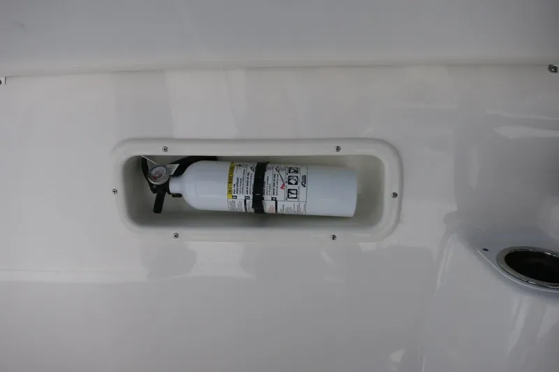 Slide: The Image of Fire extinguisher mounted on 2025 Robalo R250 Center Console boat. - 31
