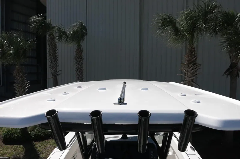 Slide: The Image of 2025 Robalo R250 Center Console boat with rod holders, viewed from above. - 35
