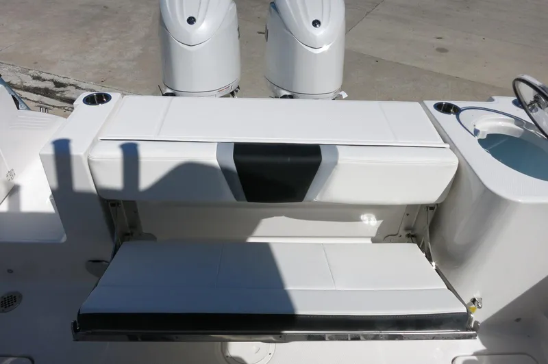 Slide: The Image of 2025 Robalo R250 Center Console boat seating and engine area. - 41