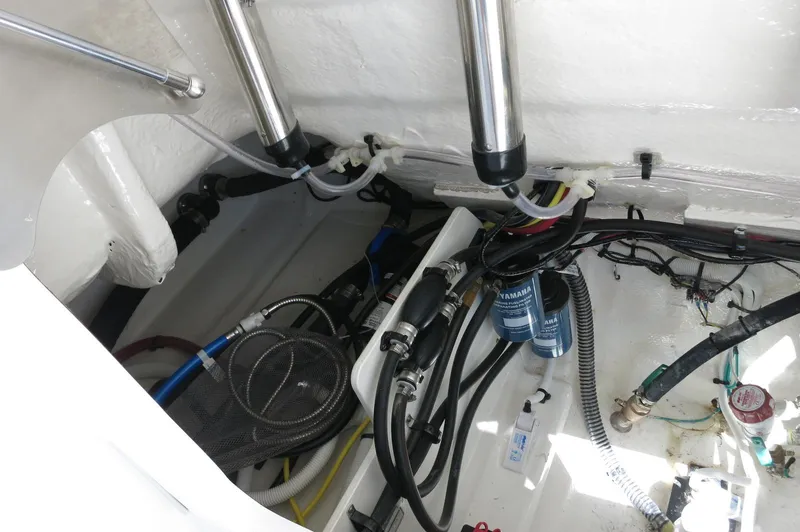 Slide: The Image of 2025 Robalo R250 Center Console boat interior wiring and components. - 44
