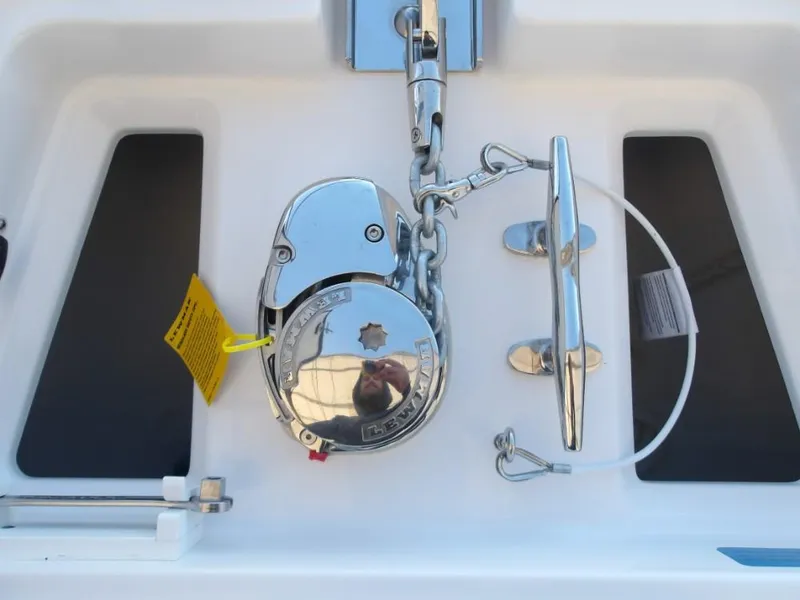 Slide: The Image of Anchor winch system on 2025 Edgewater 262 CX boat deck. - 24