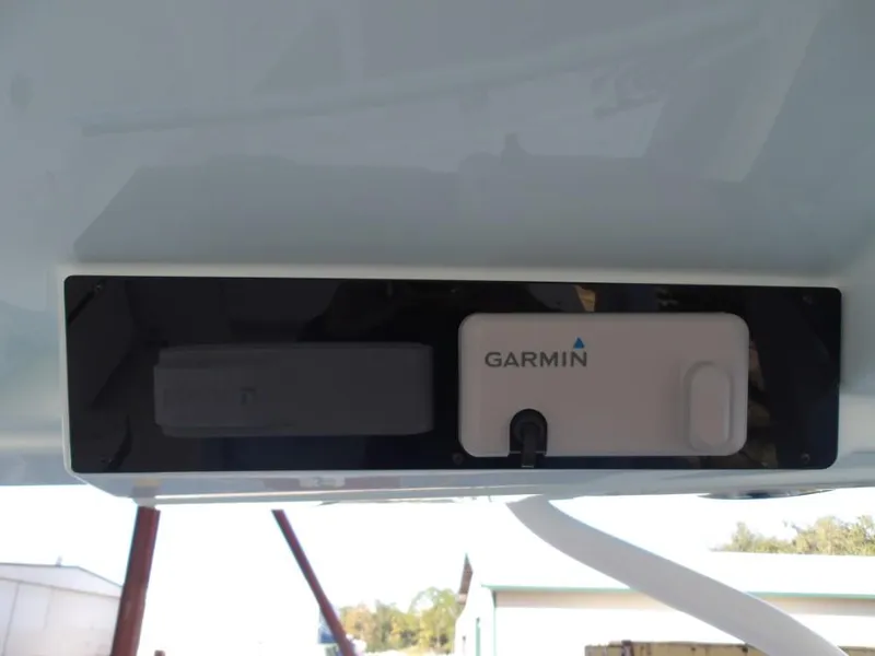 Slide: The Image of Garmin device installed on 2025 Edgewater 262 CX boat, exterior view. - 27