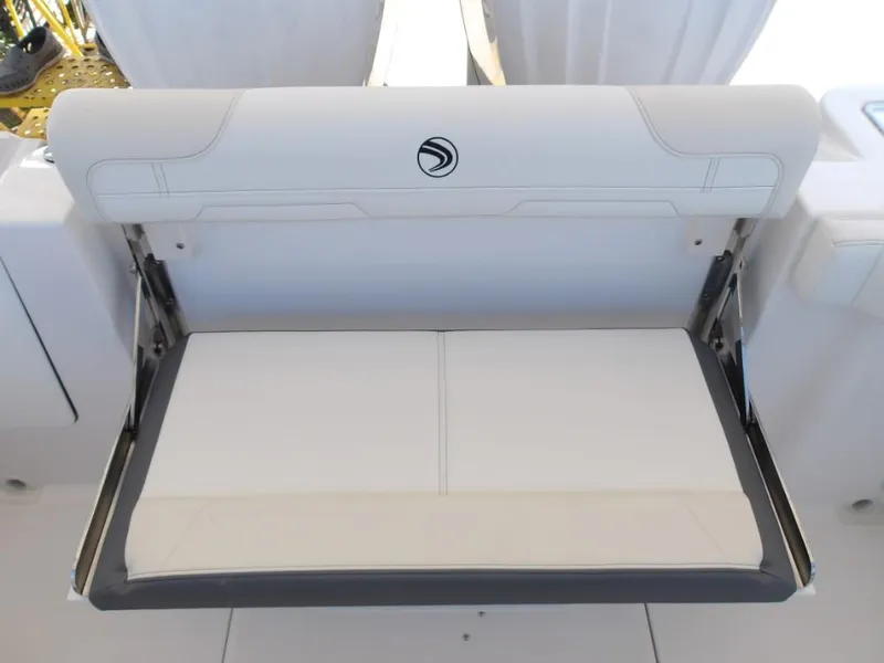 Slide: The Image of 2025 Edgewater 262 CX boat seat, white upholstery, foldable design. - 35