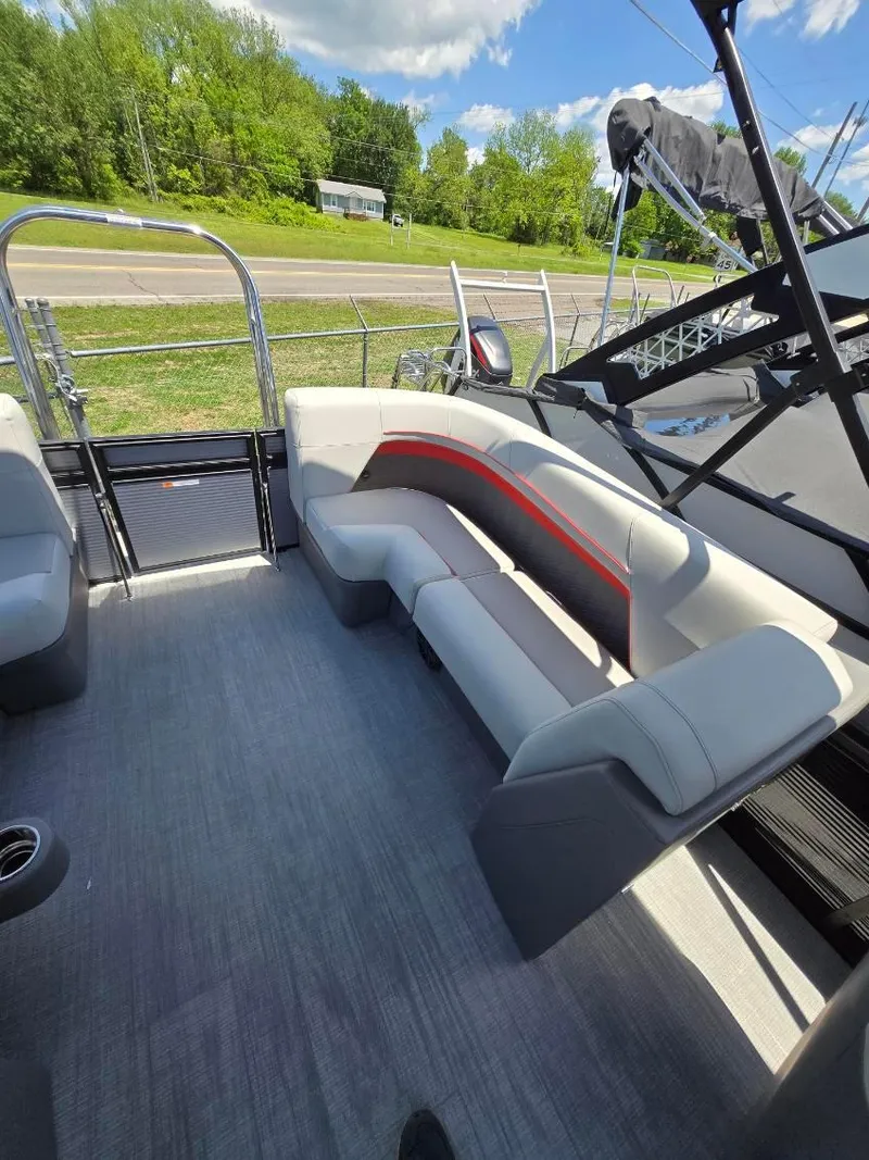 Slide: The Image of 2025 Quest 22rls boat interior with modern seating and sleek design. - 4