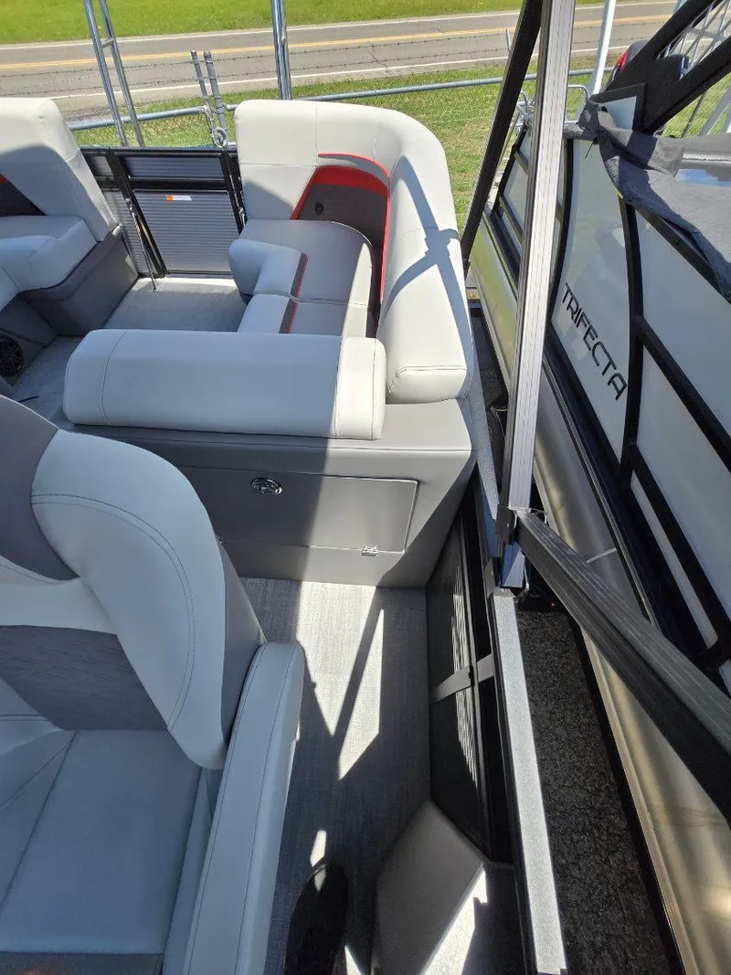 Slide: The Image of 2025 Quest 22rls boat interior with modern seating and sleek design. - 7