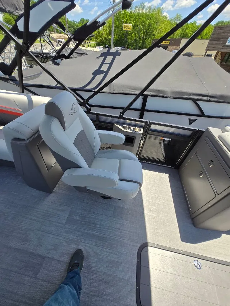 Slide: The Image of 2025 Quest 22rls boat interior with modern seating and sleek design. - 8