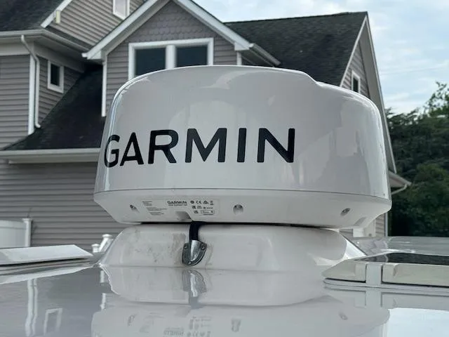 Slide: The Image of Garmin radar on 2022 NorthCoast 255 Cabin boat, with house in background. - 9