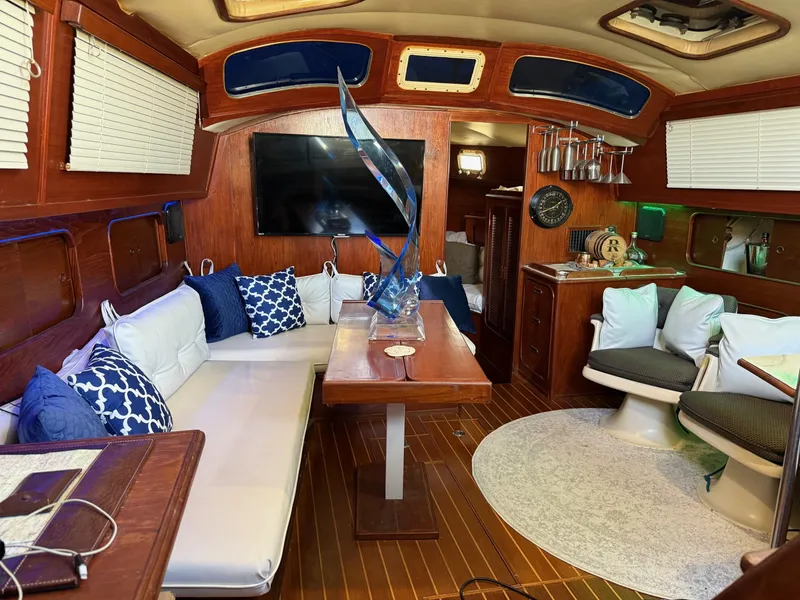 Slide: The Image of Luxurious interior of a 1982 Irwin 46 yacht with elegant seating and decor. - 15