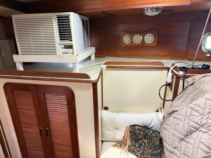 Slide: The Image of Interior of 1982 Irwin 46 yacht with air conditioner and wooden cabinetry. - 33