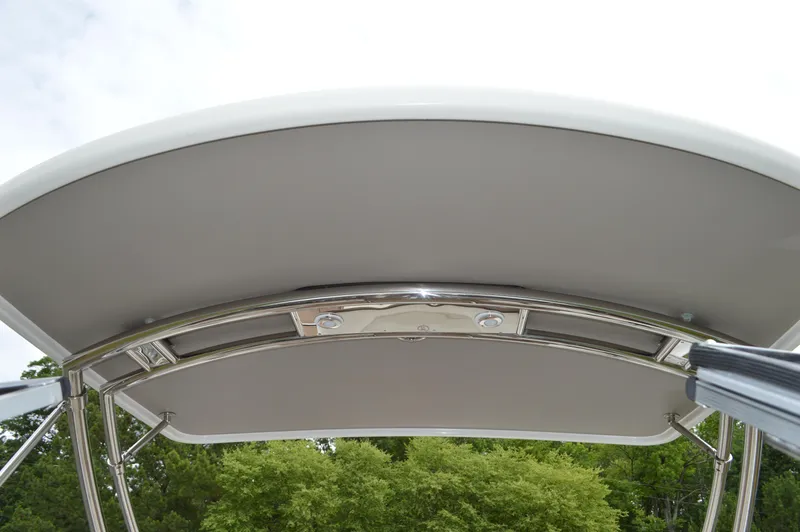 Slide: The Image of 2016 Cobalt 302 boat canopy with stainless steel frame, viewed from below. - 27