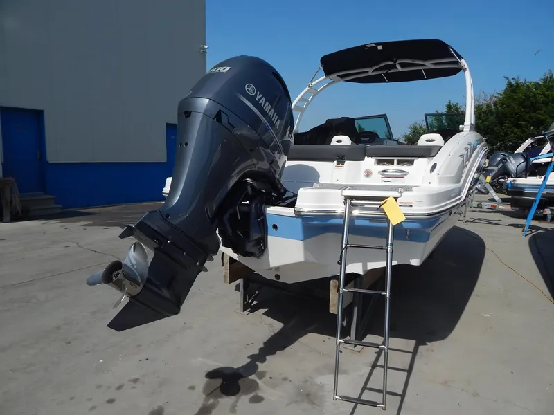 Slide: The Image of 2022 Chaparral 23 SSi OB boat with Yamaha outboard motor and ladder. - 34