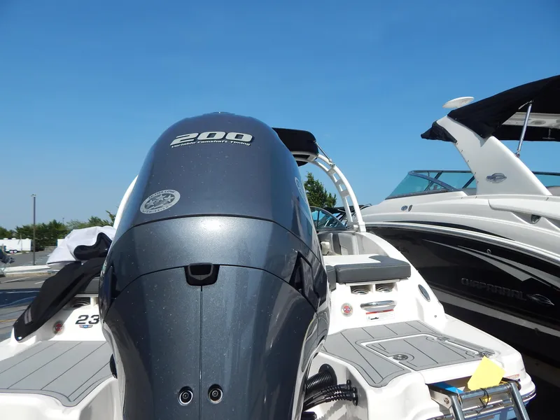 Slide: The Image of 2022 Chaparral 23 SSi OB boat with powerful 200 HP outboard engine. - 35