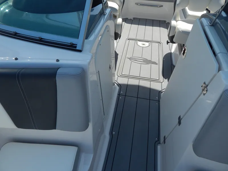 Slide: The Image of 2022 Chaparral 23 SSi OB boat interior with sleek seating and modern design. - 42