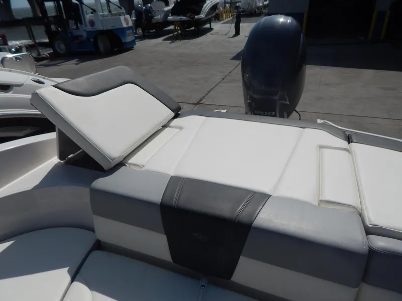 Slide: The Image of 2022 Chaparral 23 SSi OB boat with adjustable seating and outboard motor. - 46