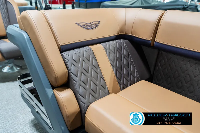 Slide: The Image of Luxurious seating on 2025 Bennington 24 MSB boat with diamond-patterned upholstery. - 24