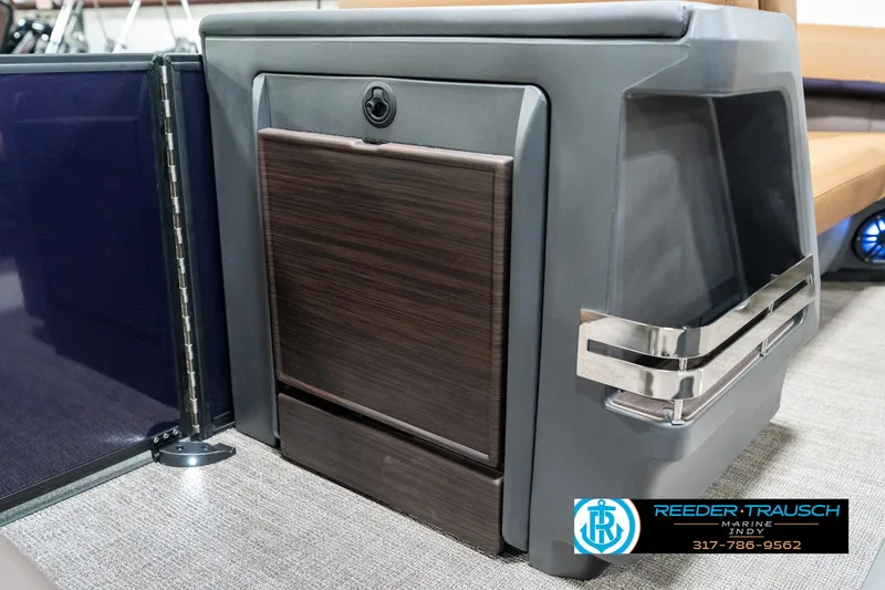 Slide: The Image of 2025 Bennington 24 MSB boat interior with sleek storage compartment and modern design. - 28