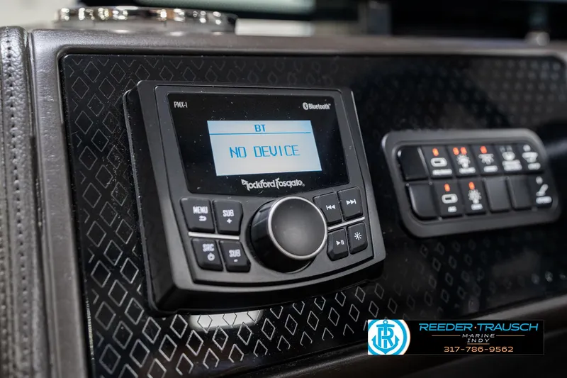 Slide: The Image of Control panel of 2025 Bennington 24 MSB with Rockford Fosgate audio system. - 33