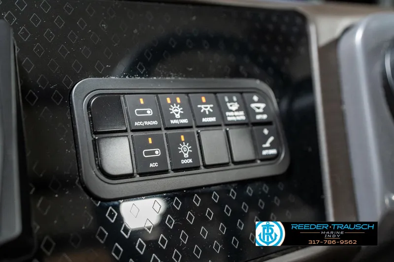 Slide: The Image of Control panel of 2025 Bennington 24 MSB boat with various function buttons. - 34