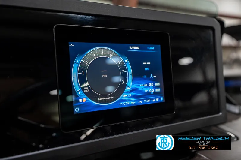 Slide: The Image of Dashboard display of 2025 Bennington 24 MSB boat showing RPM and navigation details. - 35