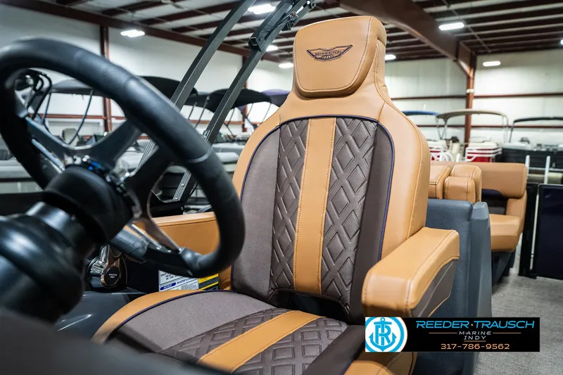 Slide: The Image of Luxurious interior of 2025 Bennington 24 MSB boat with premium seating. - 38