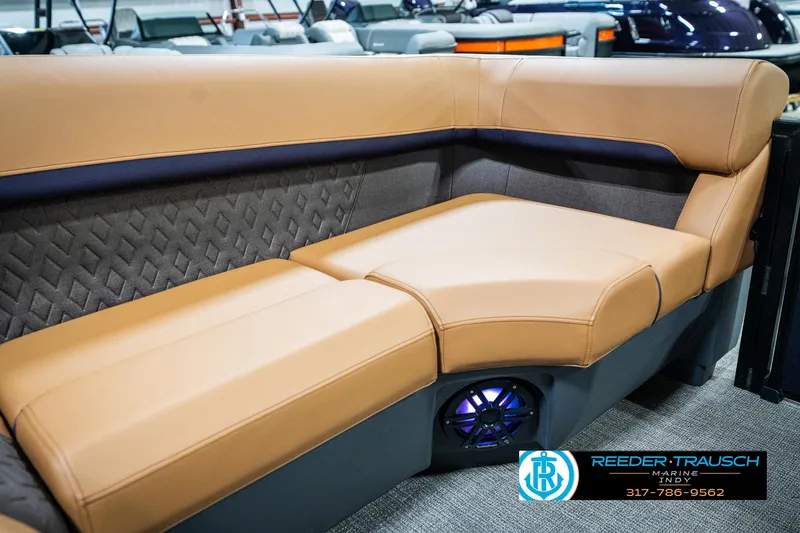 Slide: The Image of Luxurious seating on 2025 Bennington 24 MSB pontoon boat with tan upholstery. - 40