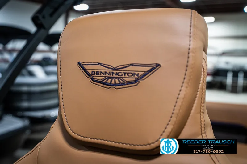 Slide: The Image of 2025 Bennington 24 MSB boat seat with embroidered logo, showcased indoors. - 41