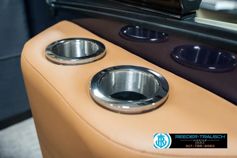 Slide: The Image of Cup holders on a 2025 Bennington 24 MSB boat, featuring sleek design and luxury finish. - 44
