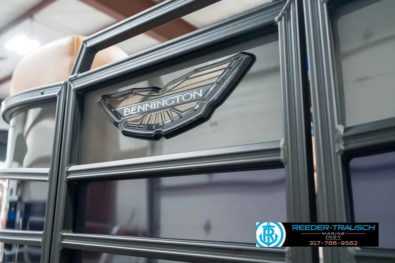 Slide: The Image of 2025 Bennington 24 MSB boat logo close-up in showroom. - 46